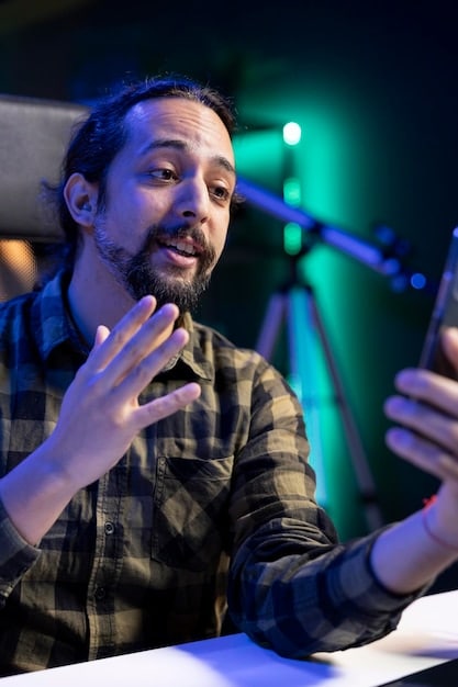Close-up shot of a band member during a live TikTok interview, highlighting their expressive face and enthusiastic interaction with the audience. The lighting is dynamic and the background features a blurred backdrop of band posters and equipment, creating an intimate and engaging atmosphere.