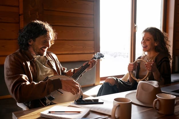 A candid shot of a rock band laughing during a relaxed interview session. The setting is a casual lounge, with instruments visible in the background. The band members are interacting naturally with the interviewer, creating a friendly and engaging atmosphere.