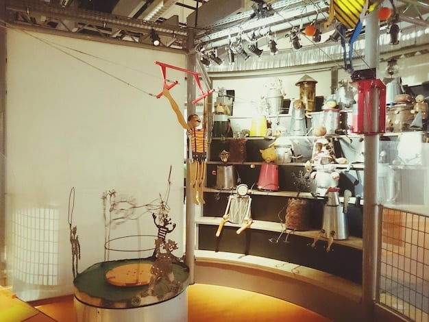 A merchandise booth at a concert venue, displaying a variety of official items such as t-shirts, posters, and hats, with well-organized displays and clear pricing, emphasizing the legitimacy and range of authentic merchandise.
