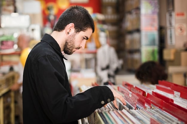 A person browsing through a crate of vinyl records in a dimly lit record store, with shelves of albums stretching into the background. The focus is on their hands flipping through the records, conveying the tactile experience of record shopping.