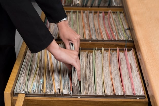 An archivist carefully handling a dusty box of old master tapes in a temperature-controlled room filled with shelves of similar boxes. The scene creates a visual narrative of preservation and discovery, with warm lighting highlighting the preservation efforts.