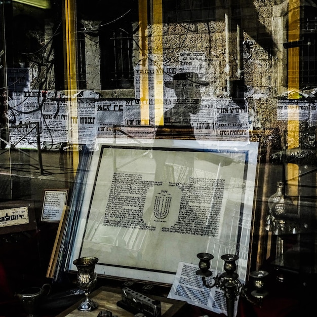 A collage of newspaper headlines and legal documents related to estate battles, emphasizing the financial and emotional toll on the families involved. The collage includes images of vintage microphones and concert posters.