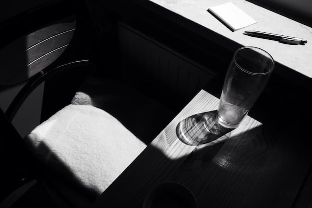 A grainy, black and white photo of a contract lying on a table next to a microphone, implying exploitative deals in the music industry. The contract is partially obscured, adding to the sense of mystery and intrigue.