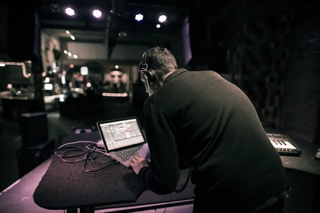 An image of a music industry analyst sitting in front of a screen displaying concert ticket sales data. The analyst is gesturing with a pen, looking concerned.