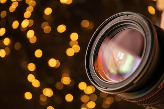 A close-up shot of a mirrorless camera with a fast prime lens attached, resting on a velvet seat in a dimly lit concert hall, ready for action.